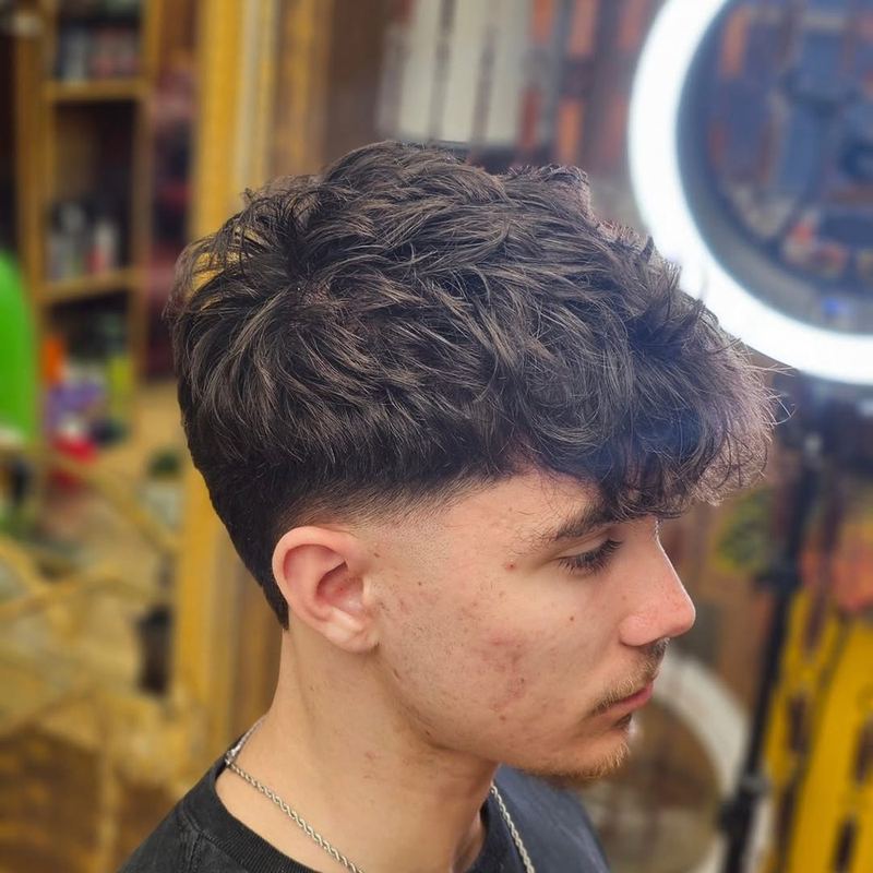 Textured crop with a tapered fade at Boss Barbers, Bath